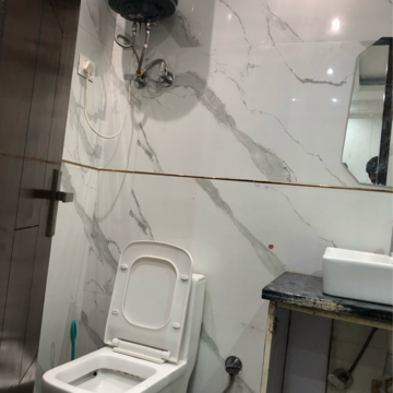 Bathroom in 3 BHK Apartment at Palm Residency Chhatarpur, Rajpur Khurd Extension – for Rent