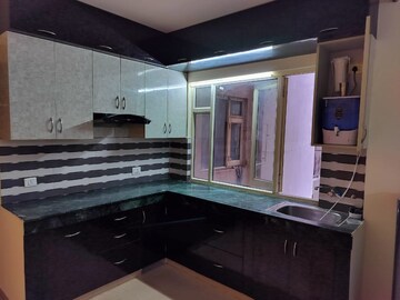 Kitchen in 2 BHK Apartment at ROF Aalayas, Sector 102 – for Rent