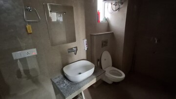 Bathroom in 3 BHK Apartment at Affinity Greens, International Airport Road – for Rent