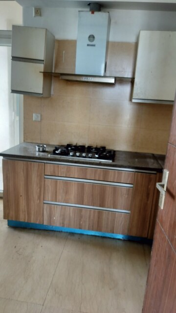 Kitchen in 3 BHK Apartment at Puri Emerald Bay, Sector 104 – for Rent