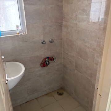 Bathroom in 1 BHK Apartment at Wave Dream Homes, Ram Nagar – for Rent