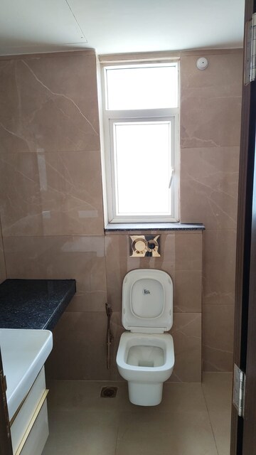 Bathroom in 3 BHK Apartment at Smart World Orchard, Sector 61 – for Sale