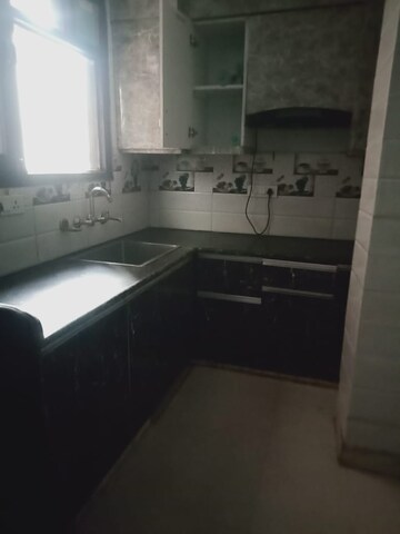 Kitchen in 2 BHK Apartment at Ansal Palam Triangle, Palam Vihar Extension – for Rent