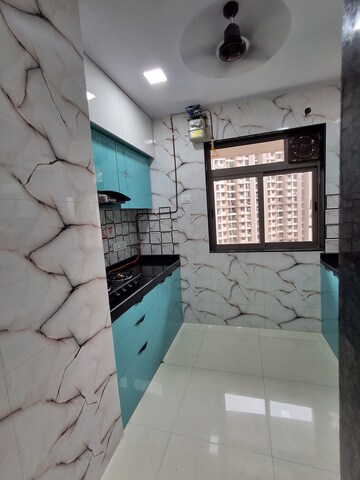 Living Room in 2 BHK Apartment at Dosti West County, Balkum Pada – for Rent