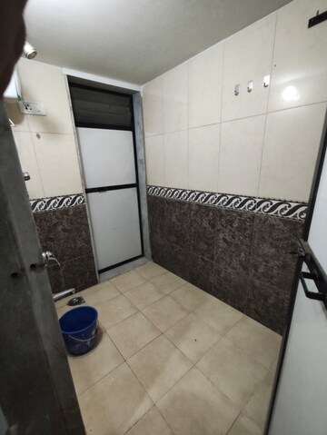 Bathroom in 1 BHK Apartment at Highland Residency CHSL, Balkum Pada – for Rent