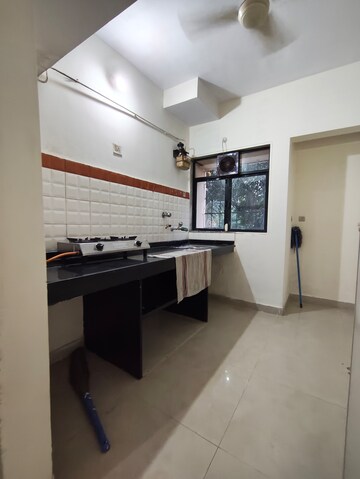 Kitchen in 1 BHK Apartment at Highland Residency CHSL, Balkum Pada – for Rent