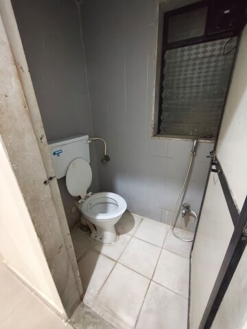 Bathroom in 1 BHK Apartment at Highland Residency CHSL, Balkum Pada – for Rent