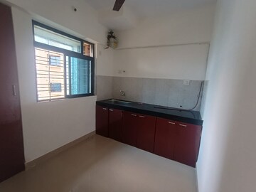 Kitchen in 1 BHK Apartment at Runwal Pearl, Manpada – for Rent