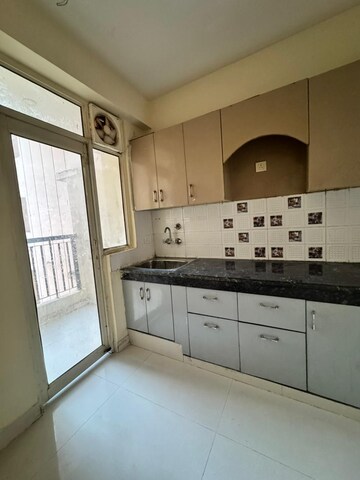 Kitchen in 2 BHK Apartment at Eureka Diya Green City, Raj Nagar Extension – for Sale