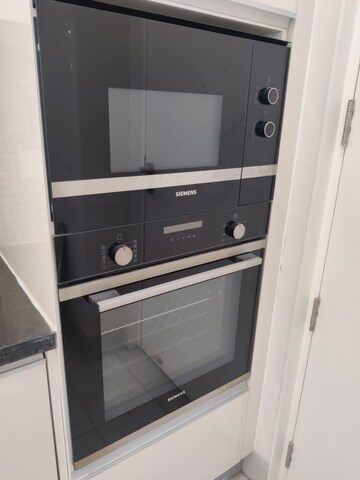 Kitchen in 3 BHK Apartment at DLF The Ultima, Sector 81 – for Rent