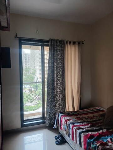 Bedroom in 2 BHK Apartment at Patel Heritage, Kharghar – for Rent