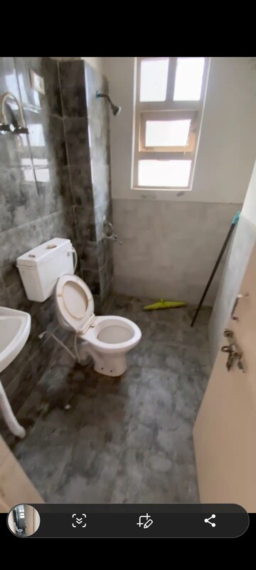 Bathroom in 1 BHK Apartment at Auric City Homes, Sector 82 – for Rent