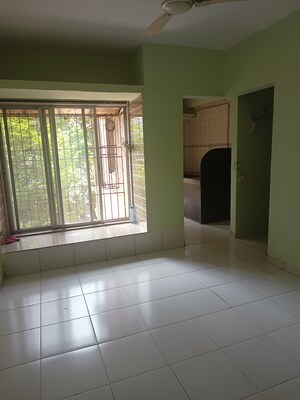 Kitchen in 1 BHK Apartment at Soham Parijat Gardens, Ghodbunder Road – for Sale