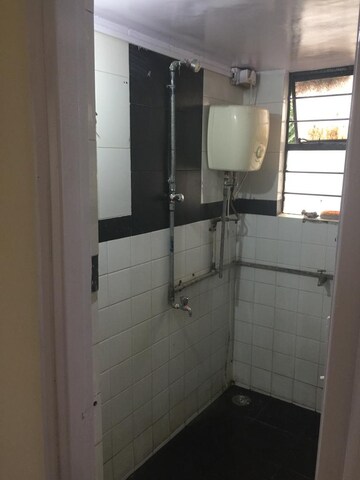 Bathroom in 1 BHK Apartment at Vandana Apartment, Senapati Bapat Road – for Rent