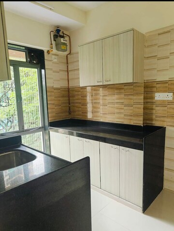 Kitchen in 2 BHK Apartment at Sai Aashirwad CHS Malad, Malad West – for Rent