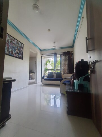 Living Room in 1 BHK Apartment at Raj Tulsi Aastha, Badlapur East – for Rent