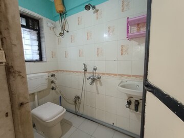 Bathroom in 2 BHK Apartment at Eveready Govind Apartment, Kopar Khairane – for Rent
