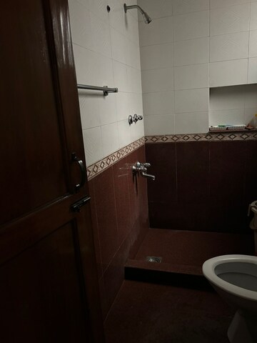 Bathroom in 4 BHK Builder Floor at Ansal Sushant Lok I, Sector 43 – for Rent
