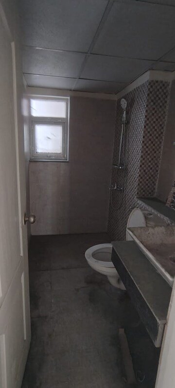 Bathroom in 3 BHK Apartment at Shri Radha Sky Gardens, Sector 16b Greater Noida – for Rent
