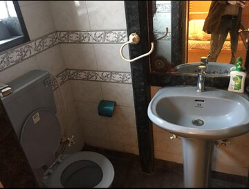 Bathroom in 2 BHK Apartment at Supreme Namrata, Khar West – for Rent