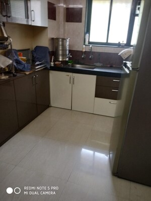 Kitchen in 1 BHK Apartment at Vaibhav Society, Wakad – for Sale