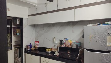 Kitchen in 2 BHK Apartment at Prasun Sai Radha, Bhandup West – for Rent