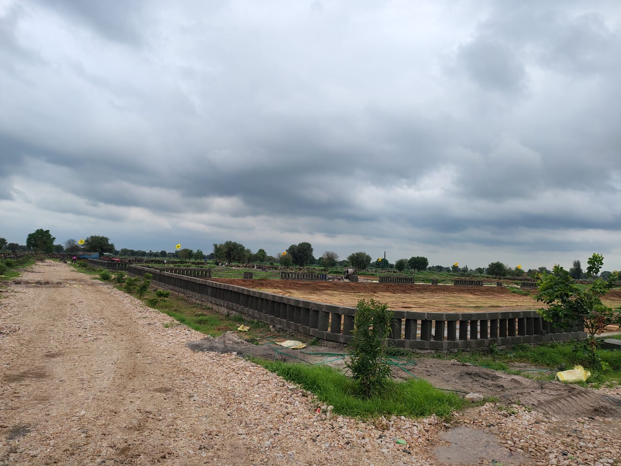 Plot For Sale in Unique City NRI Villas