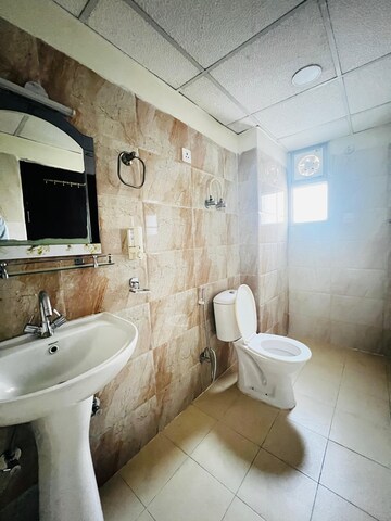 Bathroom in 2 BHK Apartment at Mahagun Mywoods, Sector 16c Greater Noida – for Rent