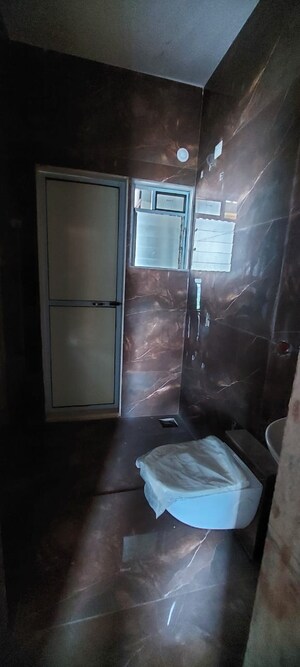 Bathroom in 3 BHK Apartment at Cosmos Horizon, Thane West – for Sale