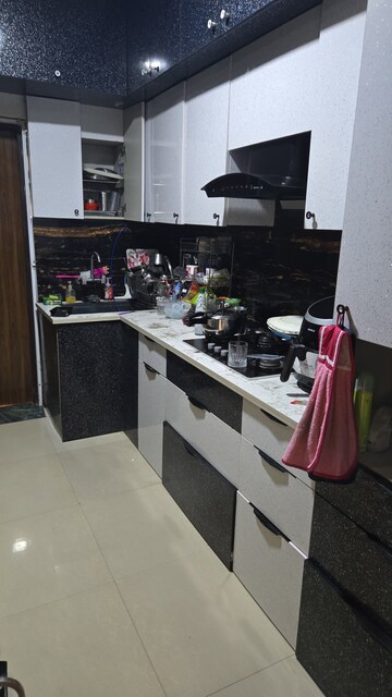 Kitchen in 3 BHK Apartment at Adore Happy Homes Grand, Sector 85 – for Sale