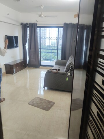 Living Room in 1 BHK Apartment at Tulsi Aura Mumbai, Ghansoli – for Rent