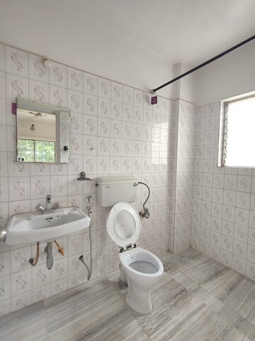 Bathroom in 2 BHK Apartment at Atur Park, Koregaon – for Rent