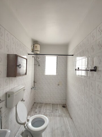 Bathroom in 2 BHK Apartment at Atur Park, Koregaon – for Rent