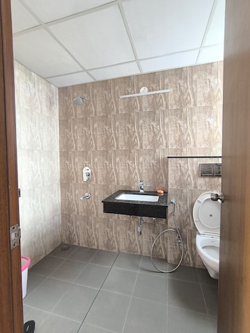 Bathroom in 3 BHK Apartment at Shapoorji Pallonji Joyville Phase 2, Sector 102 – for Rent