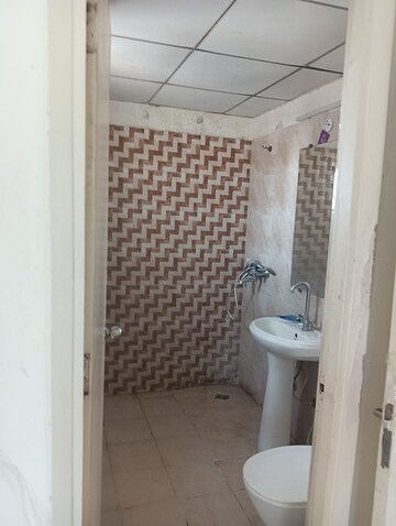 Bathroom in 2 BHK Apartment at Gaur Yamuna City, Gaur Yamuna City – for Rent