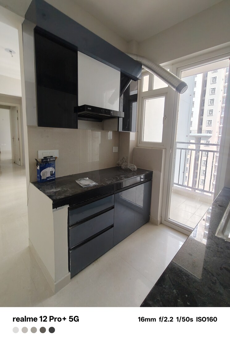 Kitchen, eldeco-live-by-the-greens 2 Bedroom 668 Sq.Ft. Apartment In Sector 150 Noida 8972412