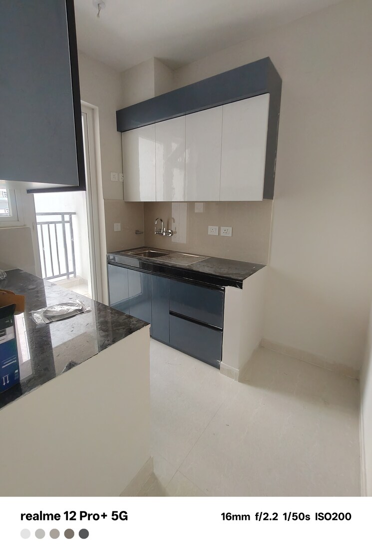 Kitchen, eldeco-live-by-the-greens 2 Bedroom 668 Sq.Ft. Apartment In Sector 150 Noida 8972412