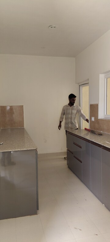 Kitchen in 3 BHK Apartment at Pardos Okas Residency, Sushant Golf City – for Rent