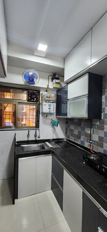 Kitchen in 2 BHK Apartment at Cosmos Horizon Phase 2, Pokhran Road No Two – for Rent
