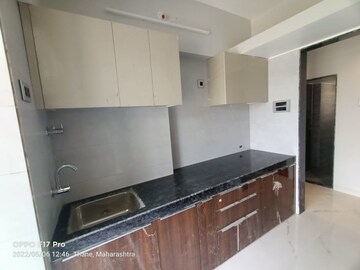 Kitchen in 2 BHK Apartment at Amar Vinay Heritage, Mira Road – for Sale