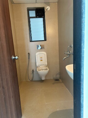 Bathroom in 2 BHK Apartment at Runwal Gardens Phase 2, Dombivli East – for Rent