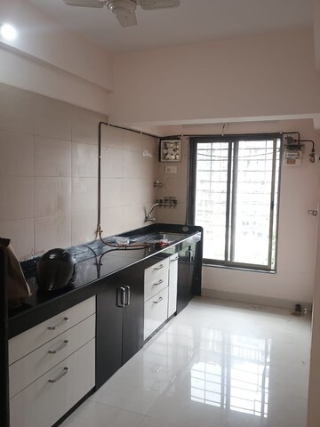 Kitchen in 1 BHK Apartment at Panom Park, Vile Parle East – for Rent