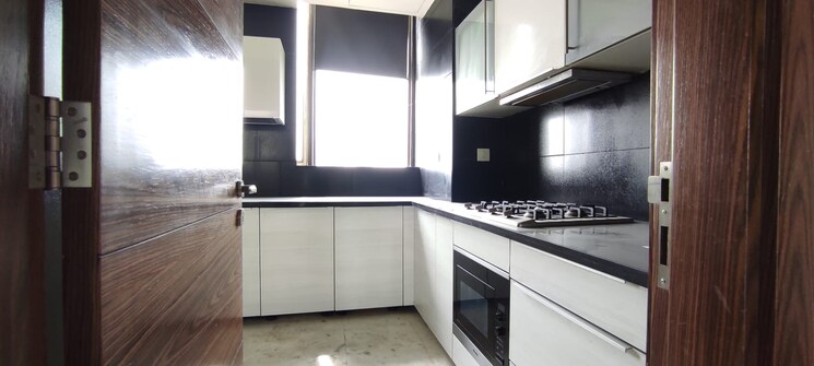 Kitchen, tulip-yellow 3 Bedroom 1704 Sq.Ft. Apartment In Sector 69 Gurgaon 8972935