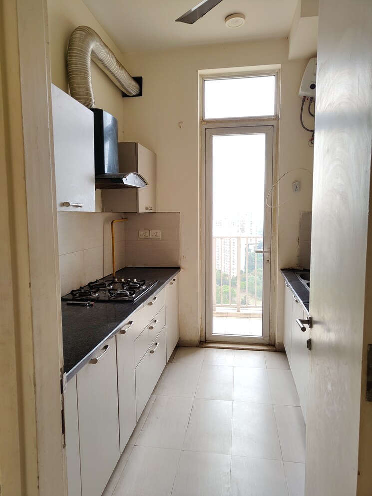 Kitchen, tulip-yellow 3 Bedroom 1704 Sq.Ft. Apartment In Sector 69 Gurgaon 8972951