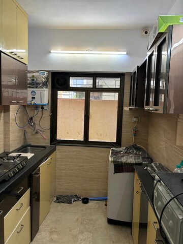 Kitchen in 1 BHK Apartment at Juhu Abhishek Chs Ltd, Andheri West – for Rent
