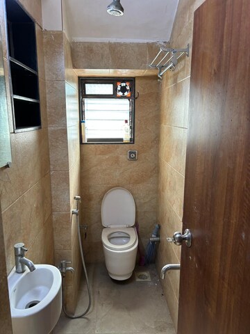 Bathroom in 1 BHK Apartment at Juhu Abhishek Chs Ltd, Andheri West – for Rent