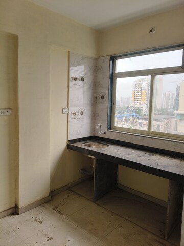Kitchen in 2 BHK Apartment at Kohinoor Lifestyle, Khadakpada – for Rent