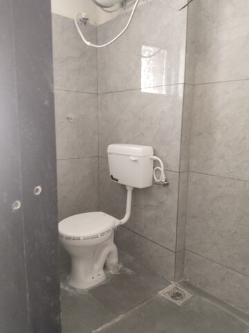 Bathroom in 4 BHK Apartment at Grafficon Apartment, Nibm Road – for Sale