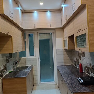 Kitchen in 2 BHK Apartment at Gaur Yamuna City Plot, Gaur Yamuna City – for Rent