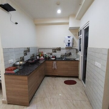 Kitchen in 2.5 BHK Apartment at Gaur Yamuna City 16th Park View, Sector 19 Yamuna Expressway – for Rent